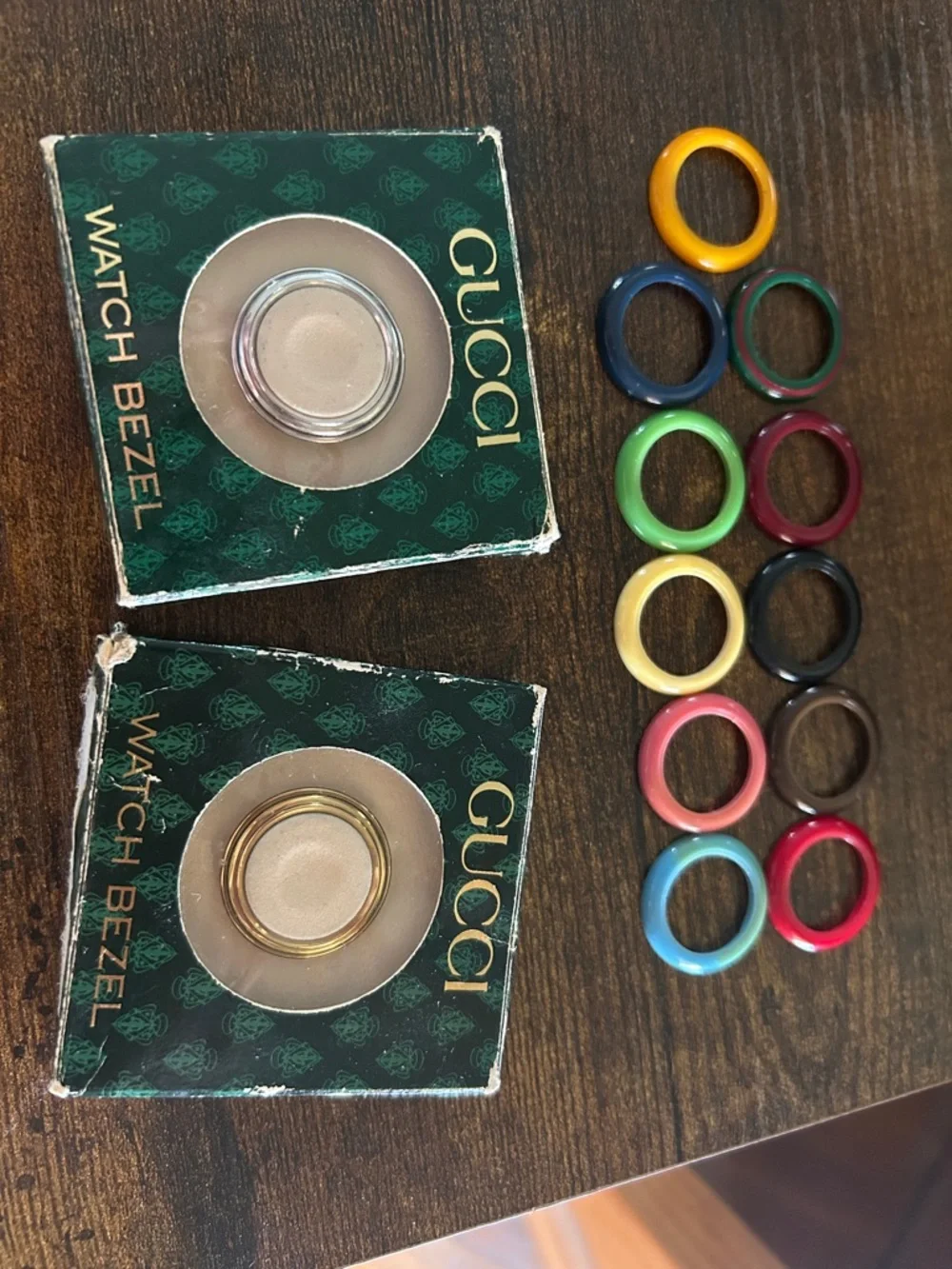 Gucci Gold Bangle Watch with Assorted Colored Interchangeable Bezels